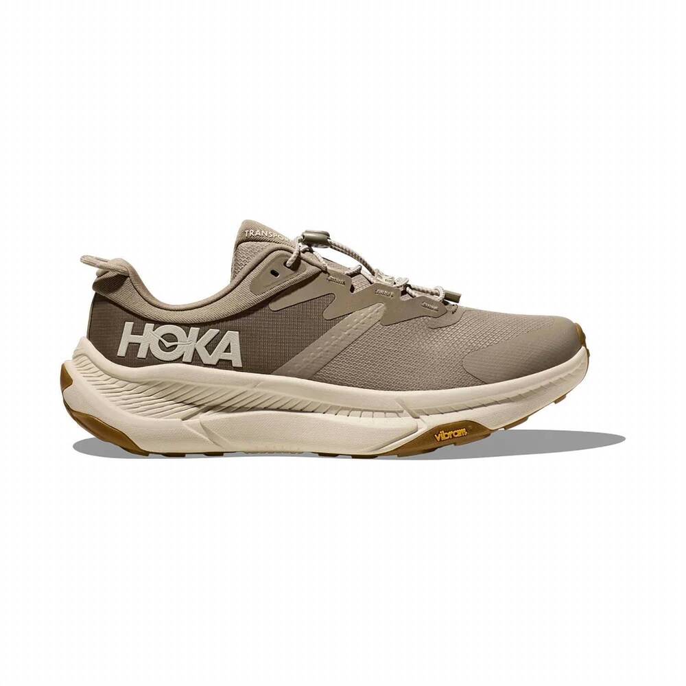 NEW HOKA men's transport shoe in dune/eggnog